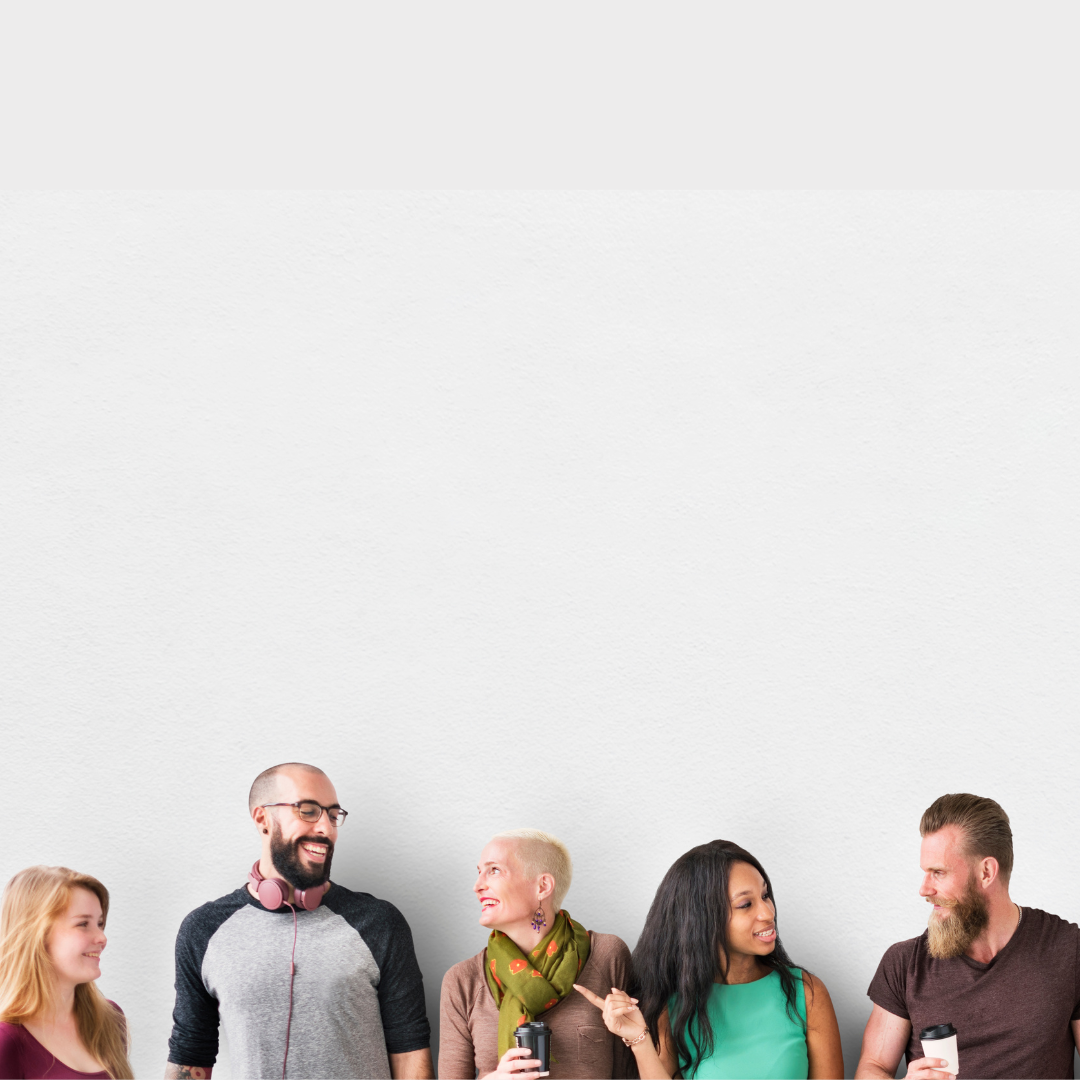 5 people standing against a wall and having a conversation.