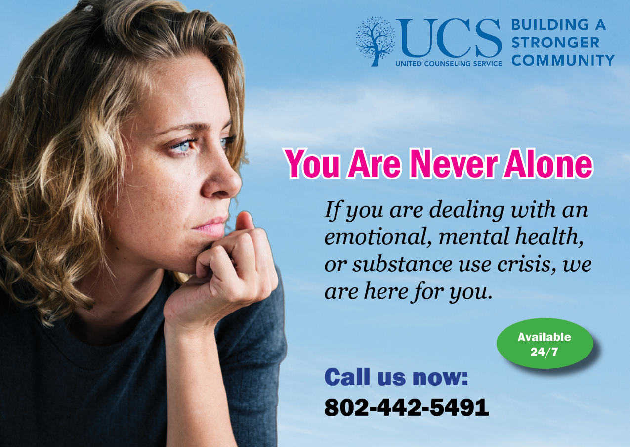 white blonde woman looking to the right of the page with hand on face, light blue sky background, with UCS logo, text says "You Are Never Alone, If you are dealing with an emotional, mental health, or substance use crisis, we are for you. Available 24/7, Call us now: 802-442-5491"
